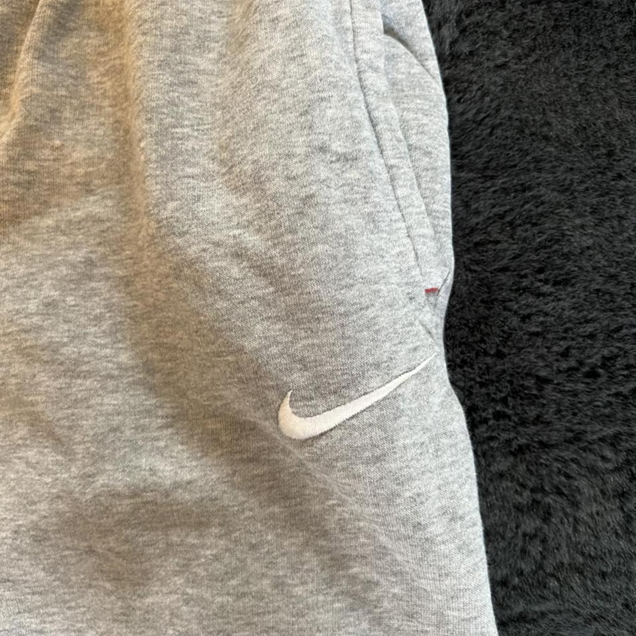 Nike grey tracksuit bottoms. Size L ( teenagers)... Depop