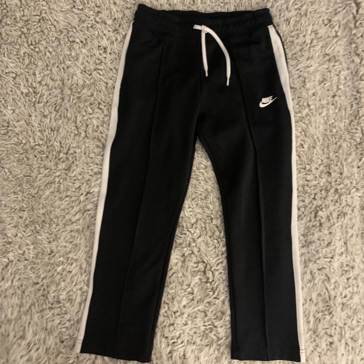 Nike polyknit track pants- black with white side... - Depop