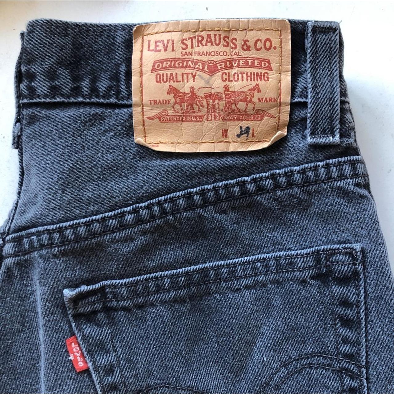 vintage levi’s relaxed fit shorts in black labelled... - Depop
