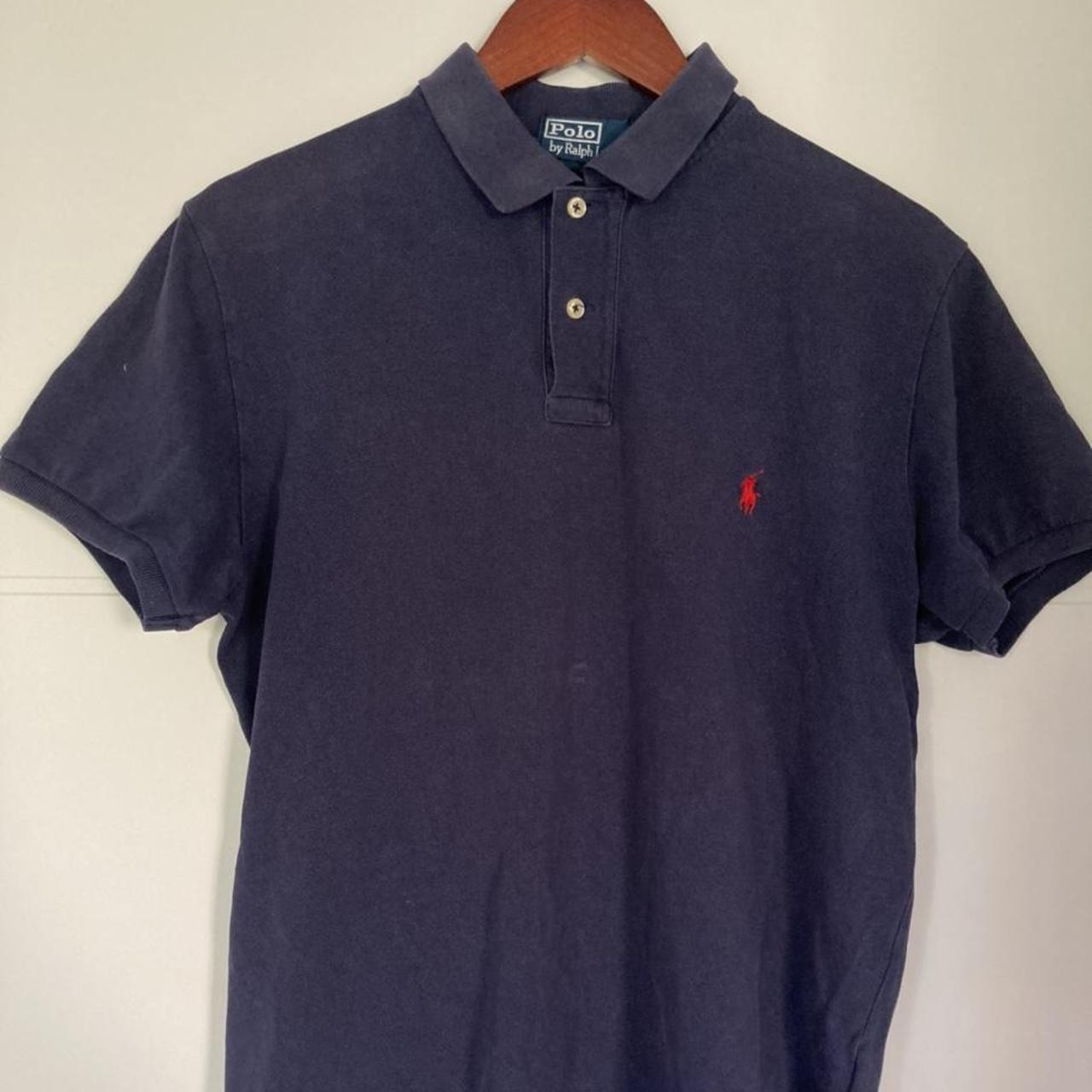 Ralph Lauren Navy Polo Worn with some signs of... - Depop