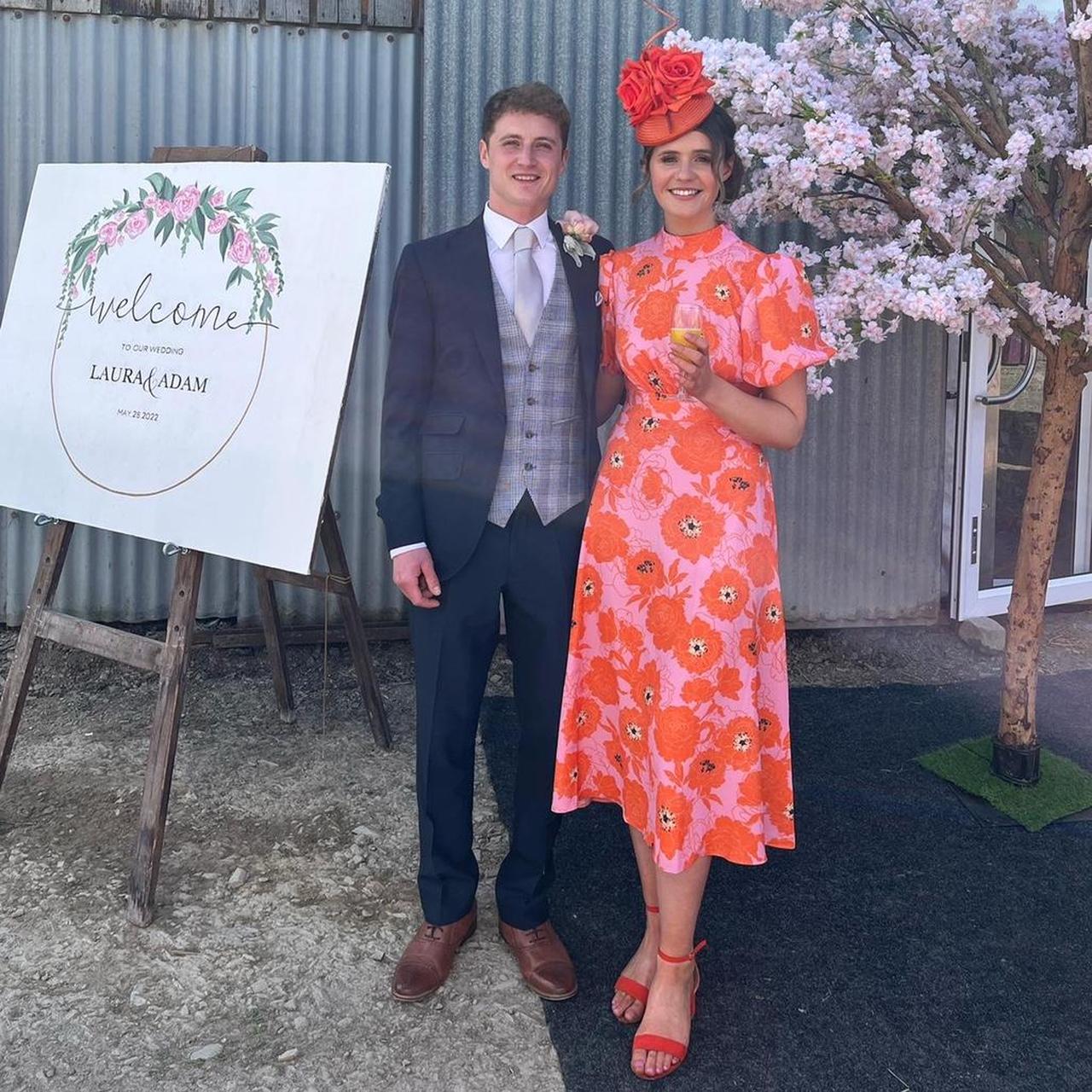 Forever unique pink and orange floral midi dress... Depop