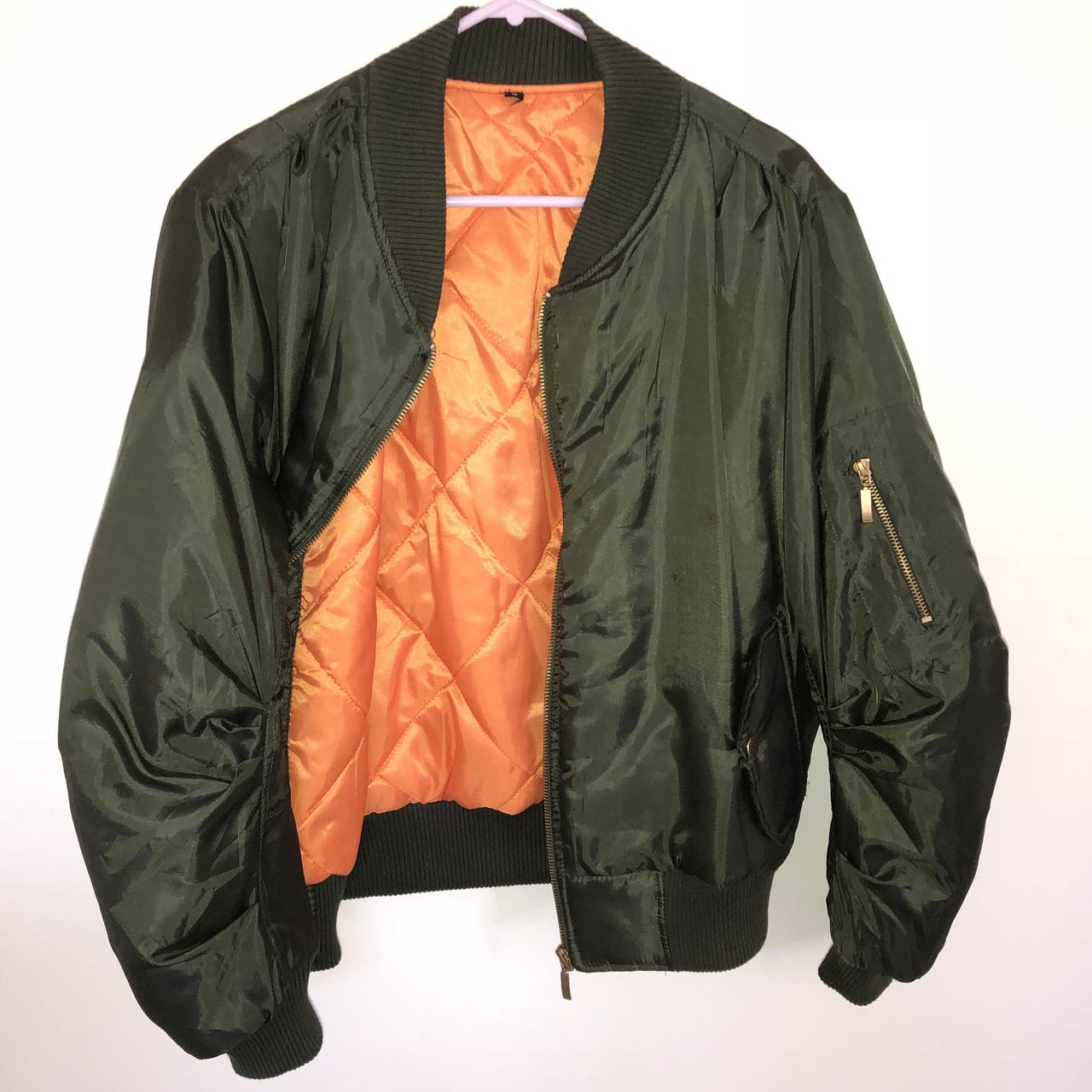 black puffer jacket orange inside