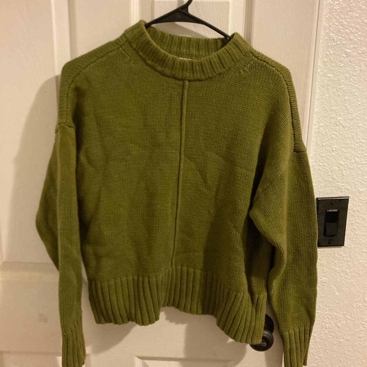 Knitted forest green sweater. The color is a lot... Depop