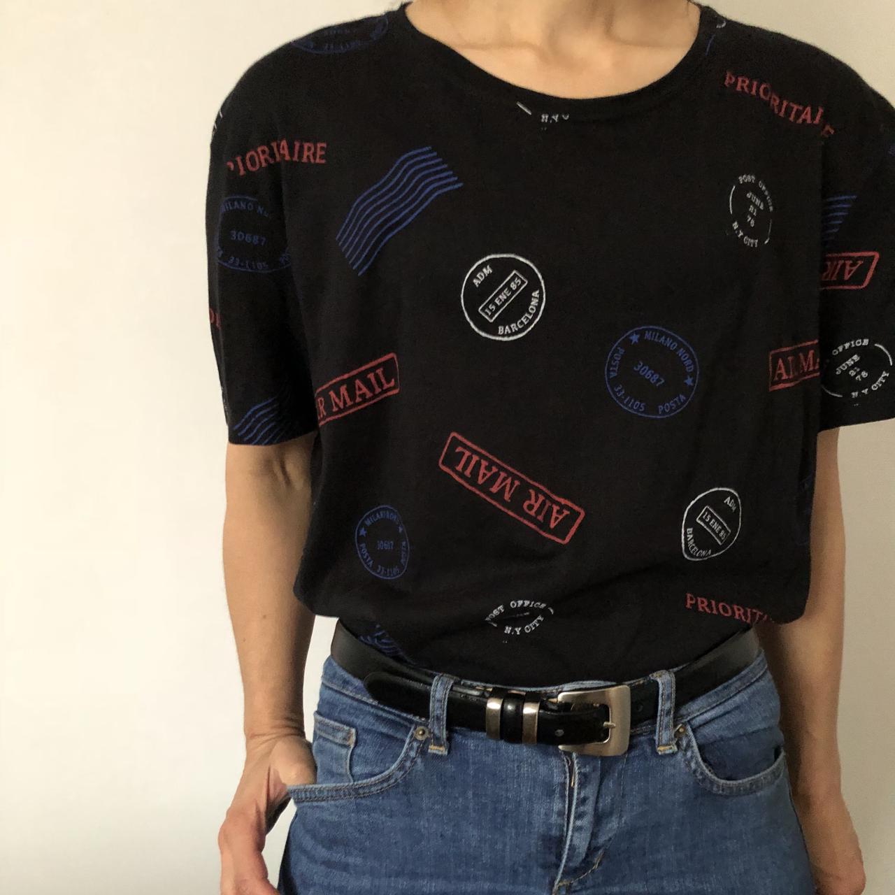 Black pull and bear T-shirt. With travel stamp print... - Depop