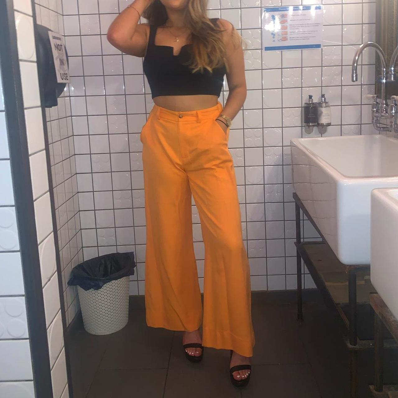 bright orange trousers