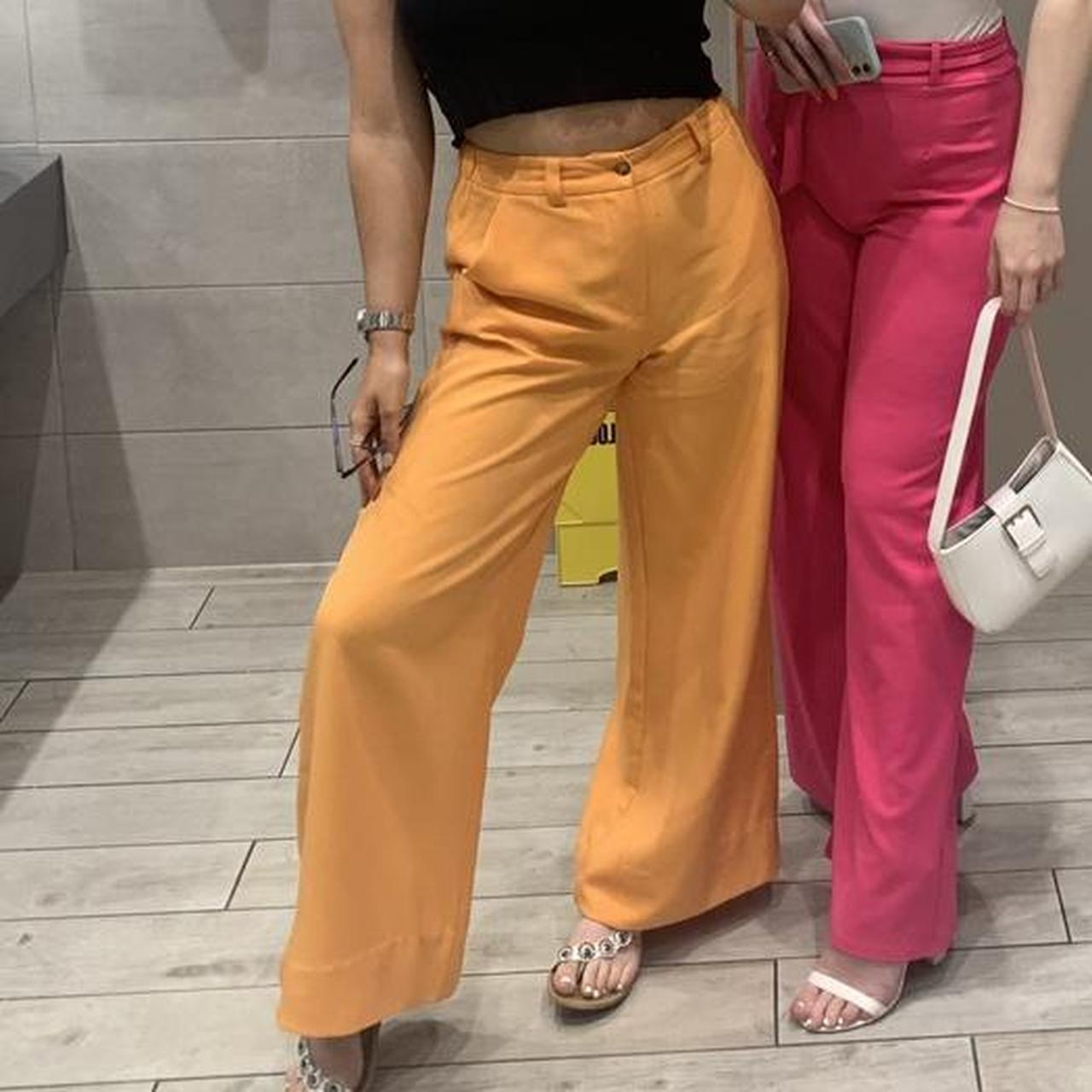 bright orange trousers