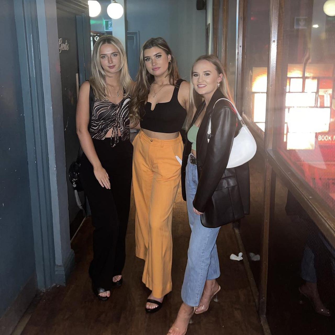 bright orange trousers