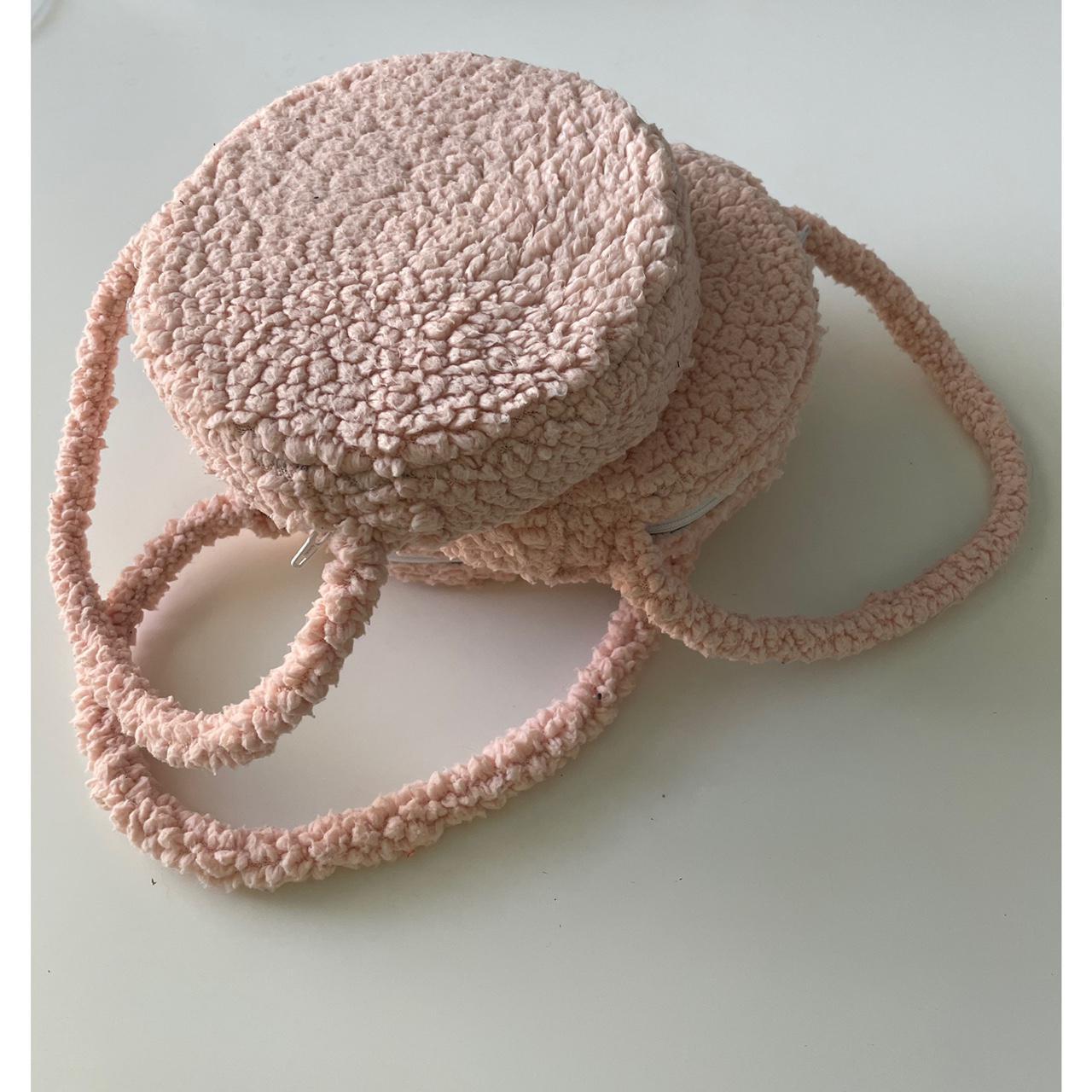 This fuzzy pink hand bag is made almost completely... - Depop