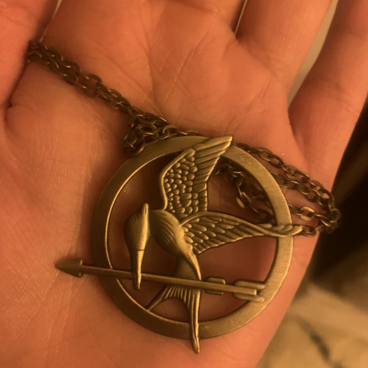 NECA The Hunger Game Catching Fire Friendship Necklace India | Ubuy