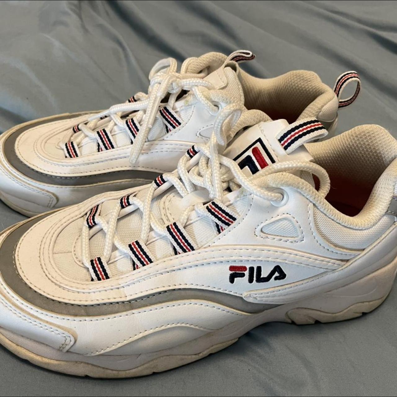 Fila sneakers with a reflective stripe They re in. Depop