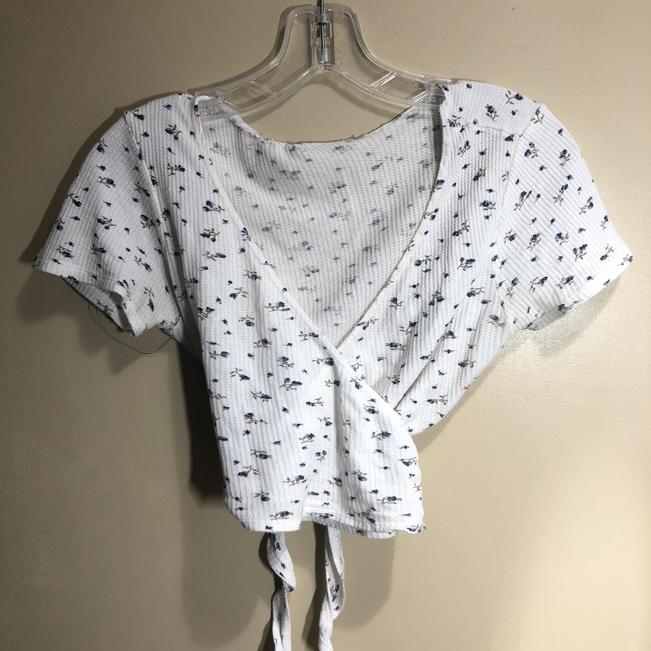 free shipping brandy melville blue floral print... Depop