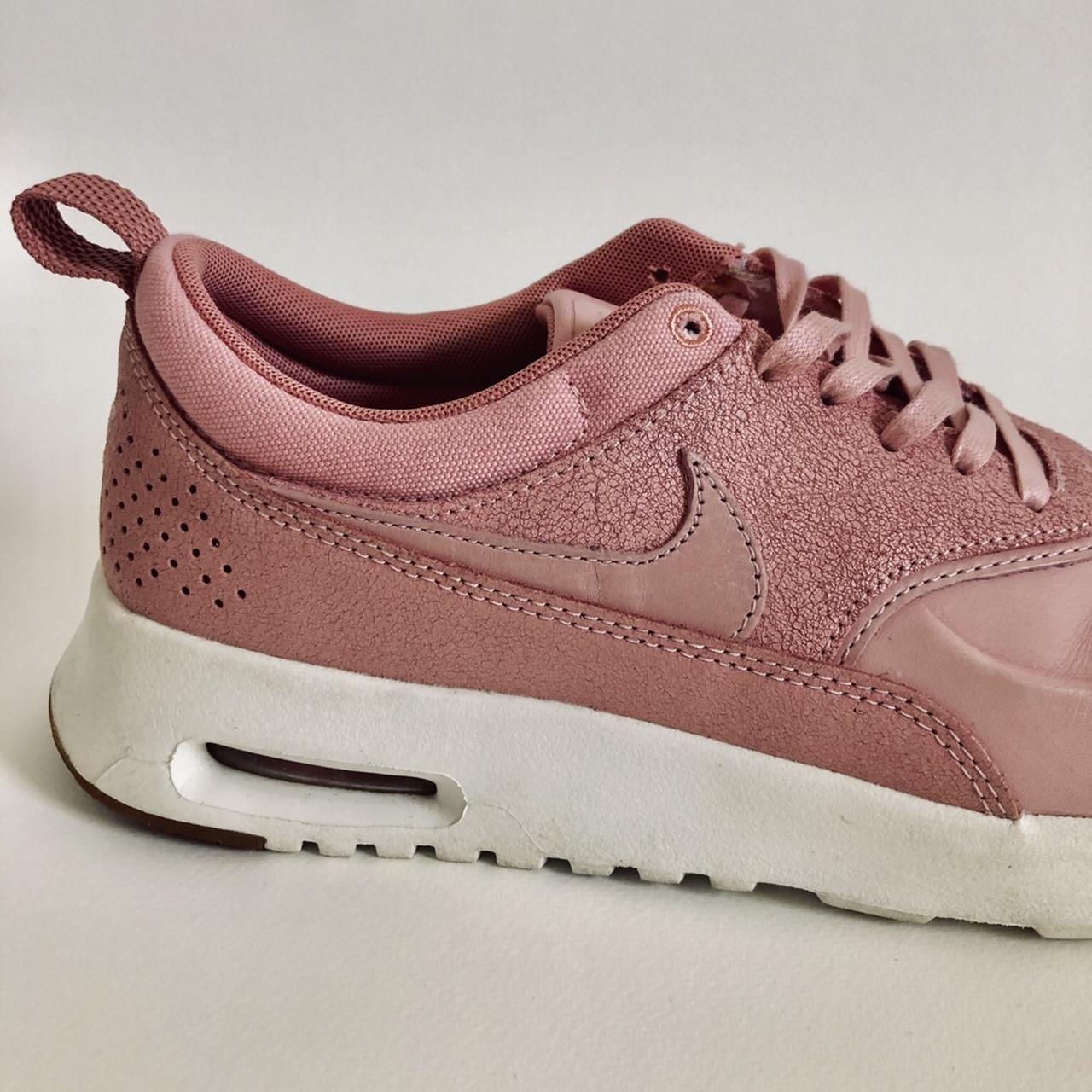 Nike thea pink clearance trainers