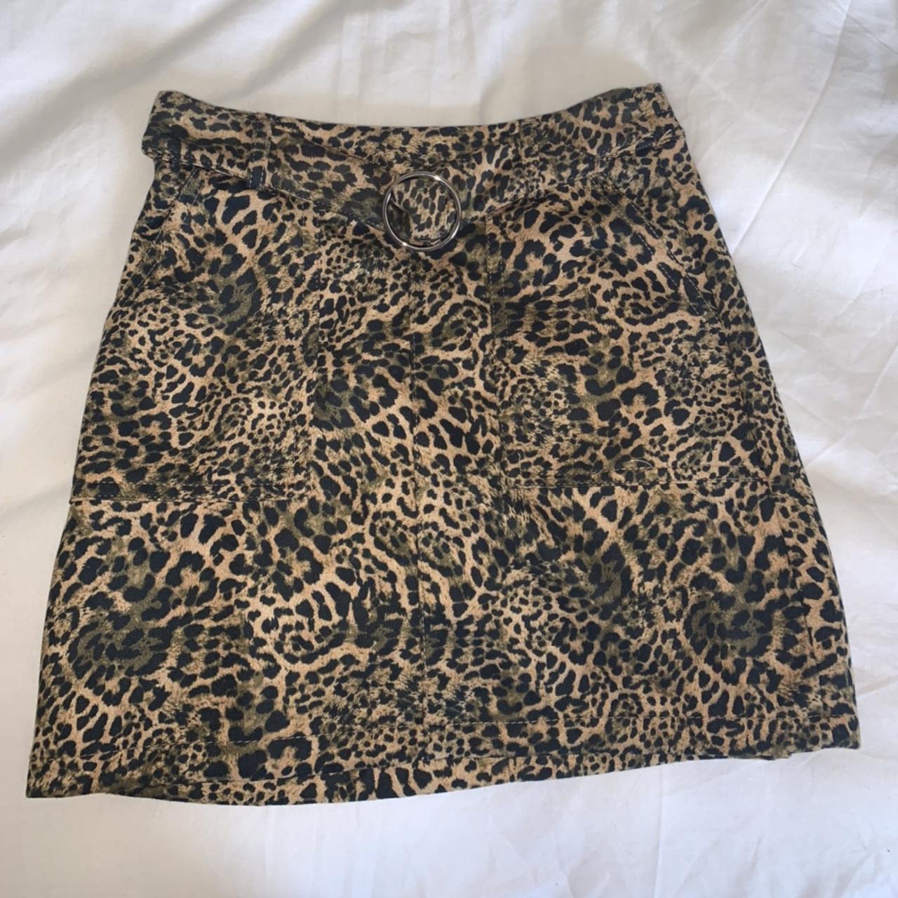 Selling this animal print skirt with belt from... - Depop