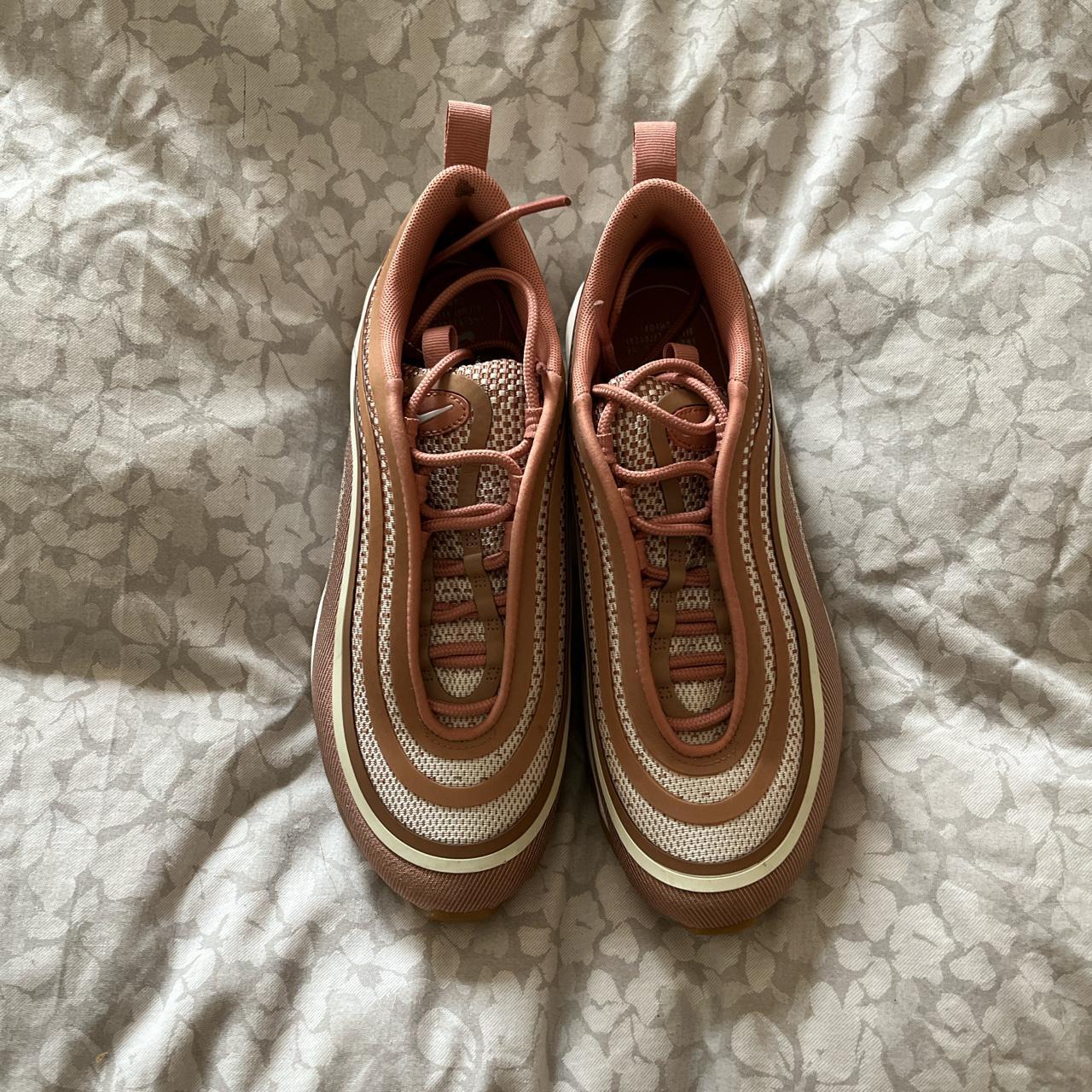 pink nike 97s