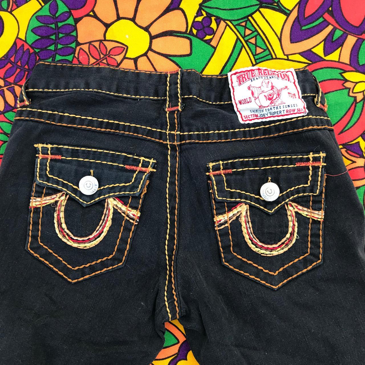 black and yellow true religion jeans