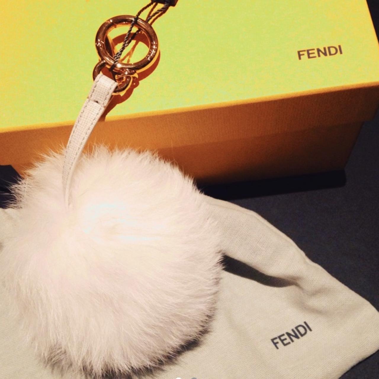 100 authentic Fendi White fur ball. RRP 250