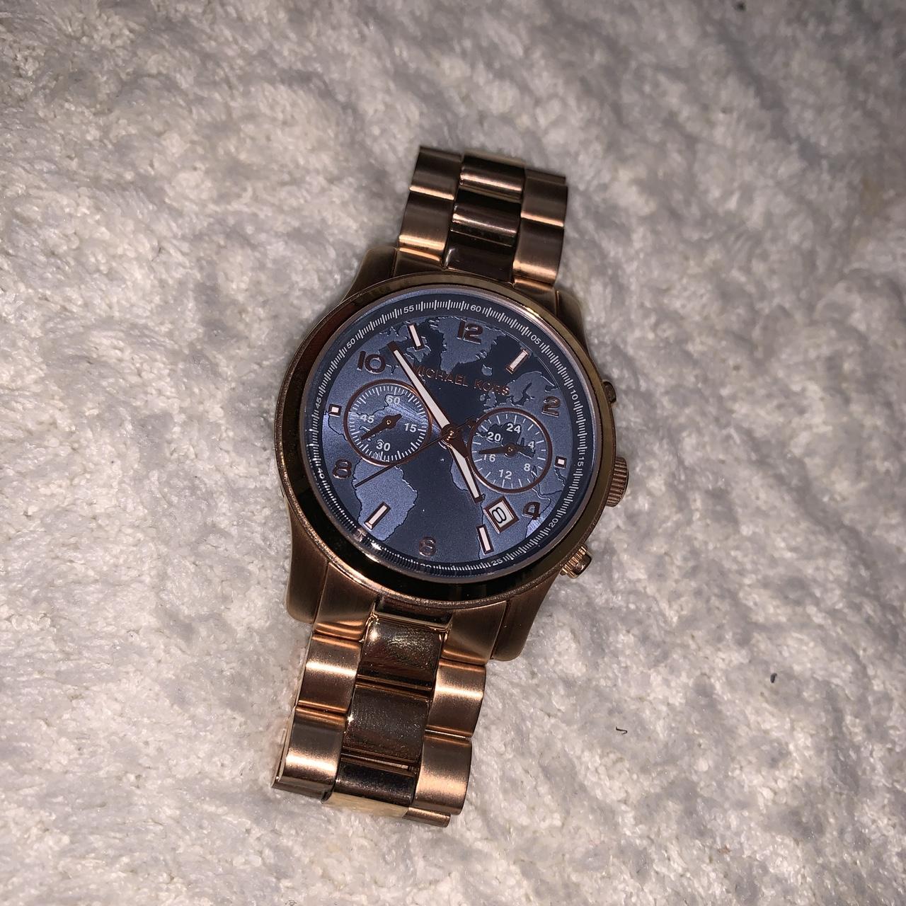 Michael kors rose deals gold world map watch