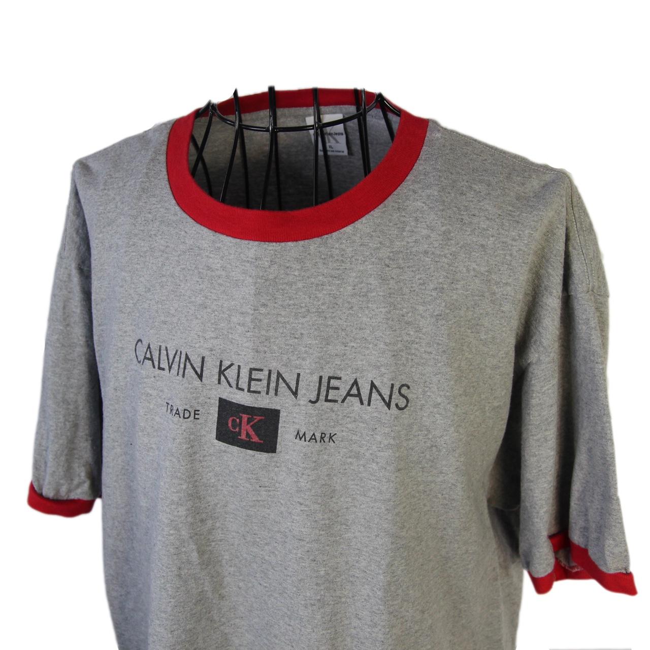 Vintage Calvin Klein Ringer T Shirt. Features... - Depop