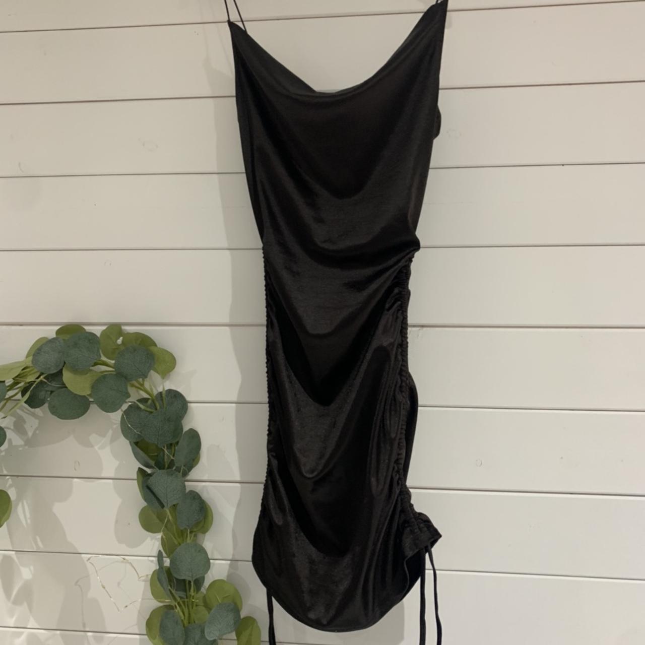 Black H&M slip dress with adjustable ruched sides.... Depop