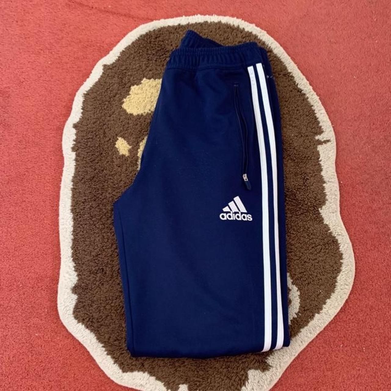 Adidas blue joggers white 3 stripes Zip pockets and... - Depop