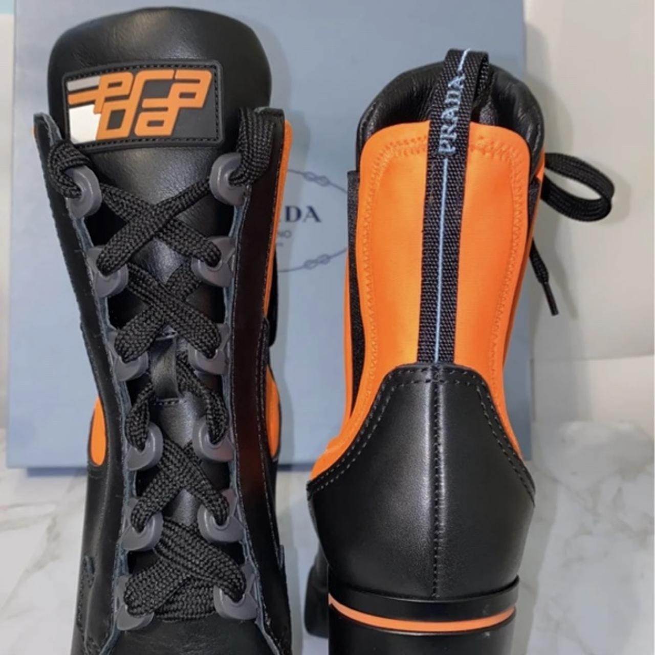 Black and orange prada boots best sale