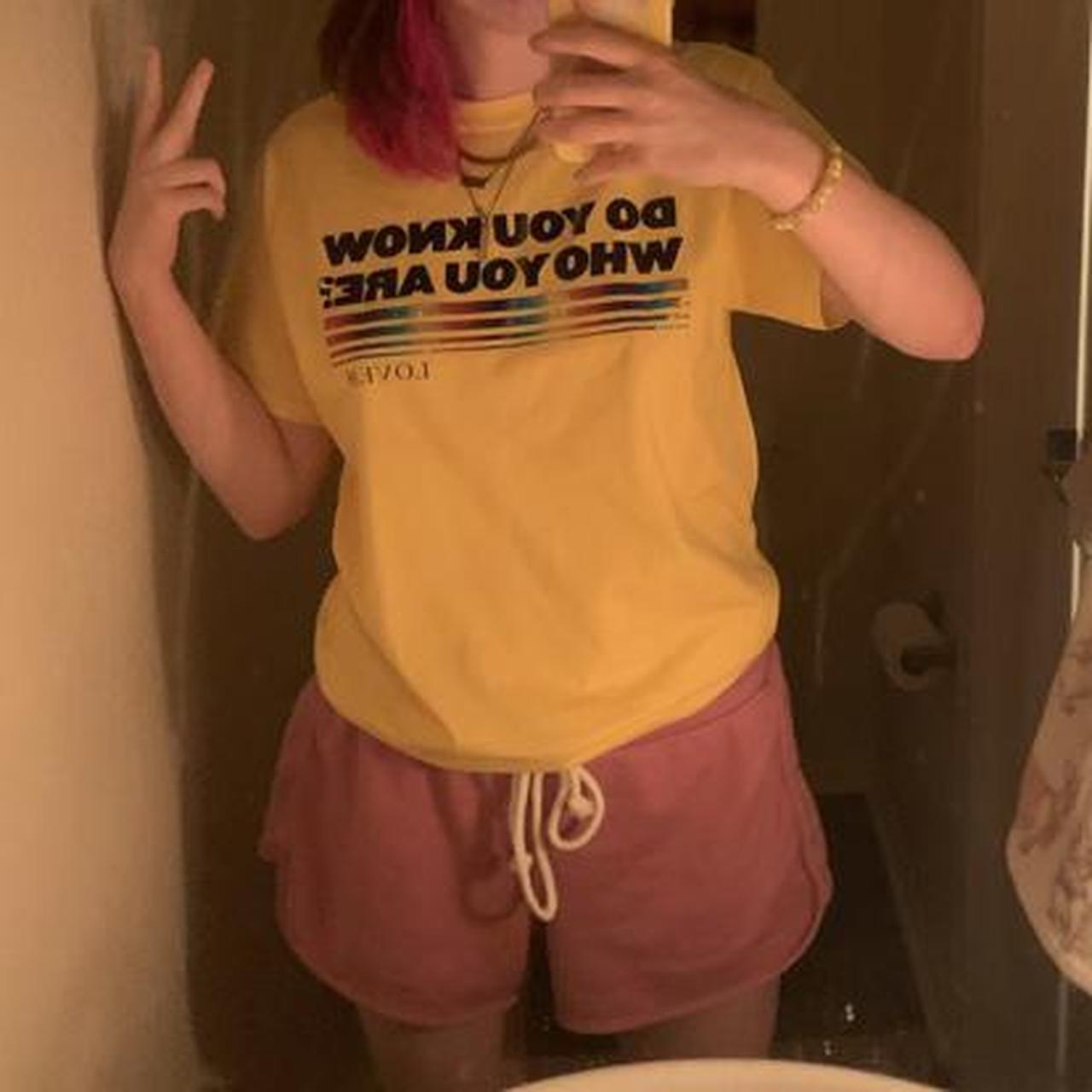 harry styles in yellow shirt