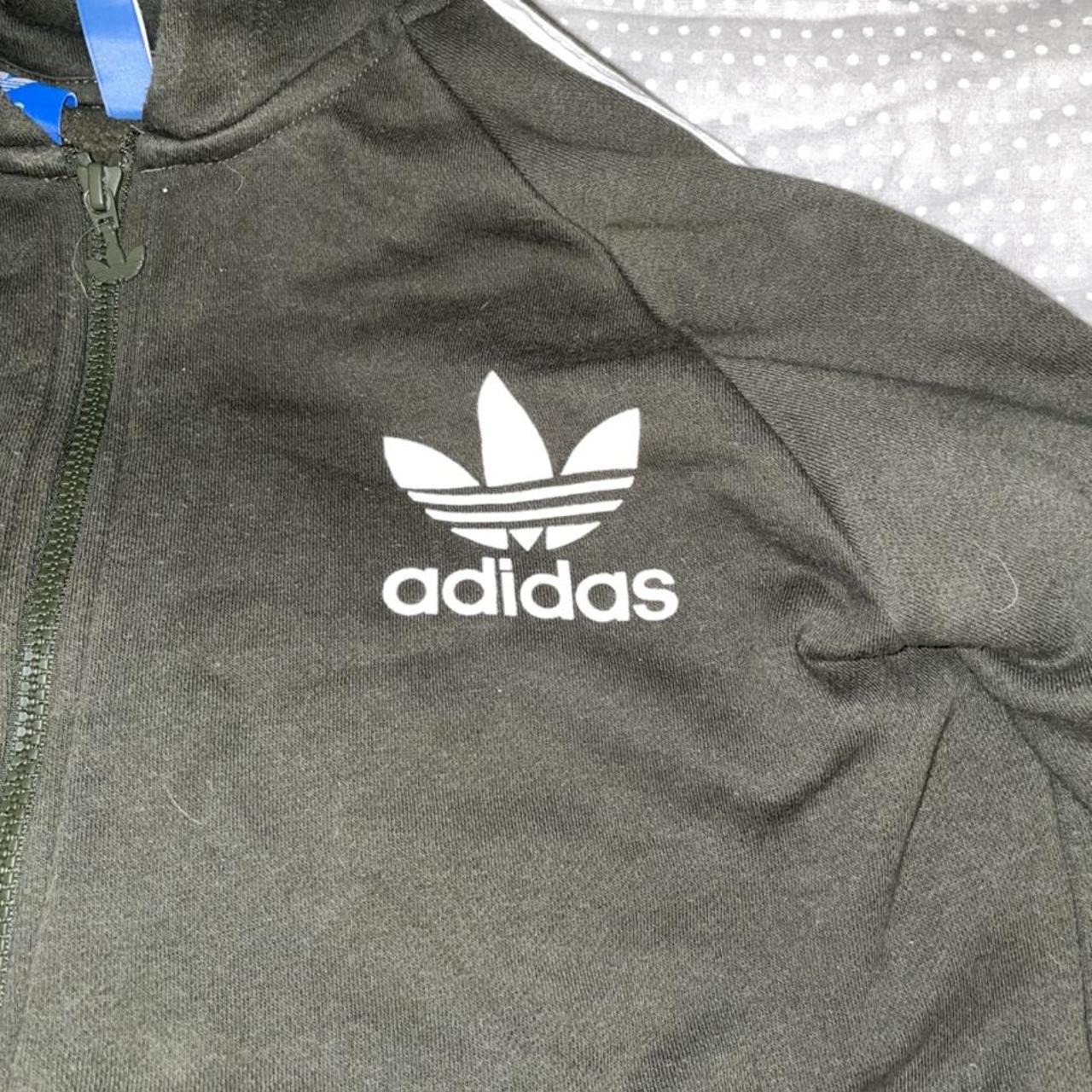 grey and green adidas tracksuit