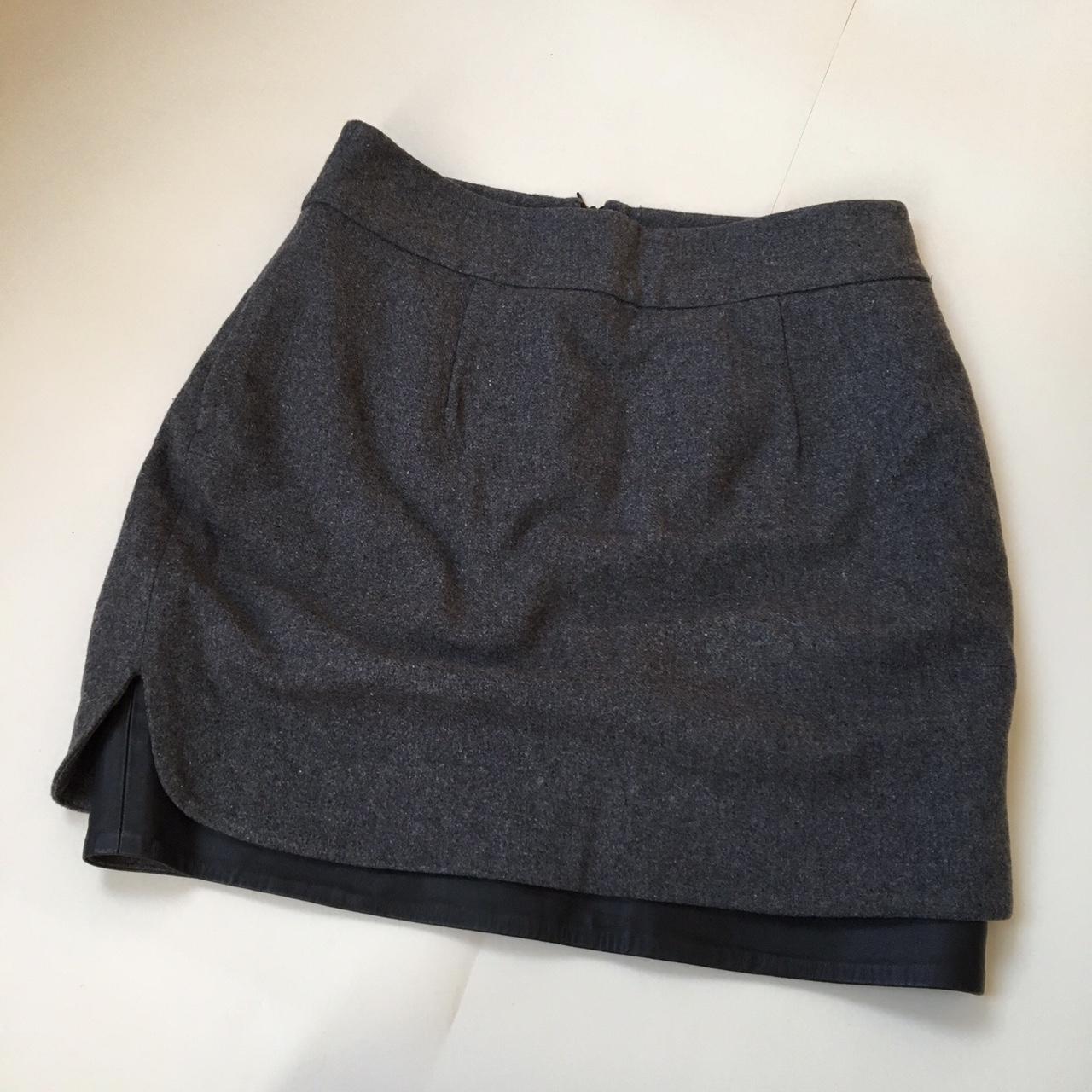 Grey wool skirt with leather trimmed... - Depop