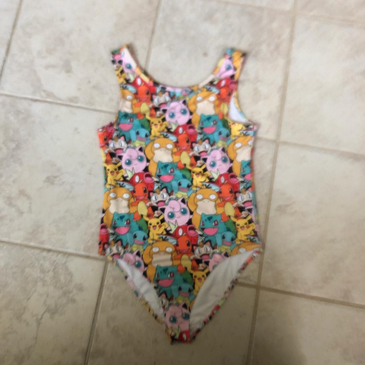 One piece pokemon swimsuit! size 11/12 girls or xs... - Depop