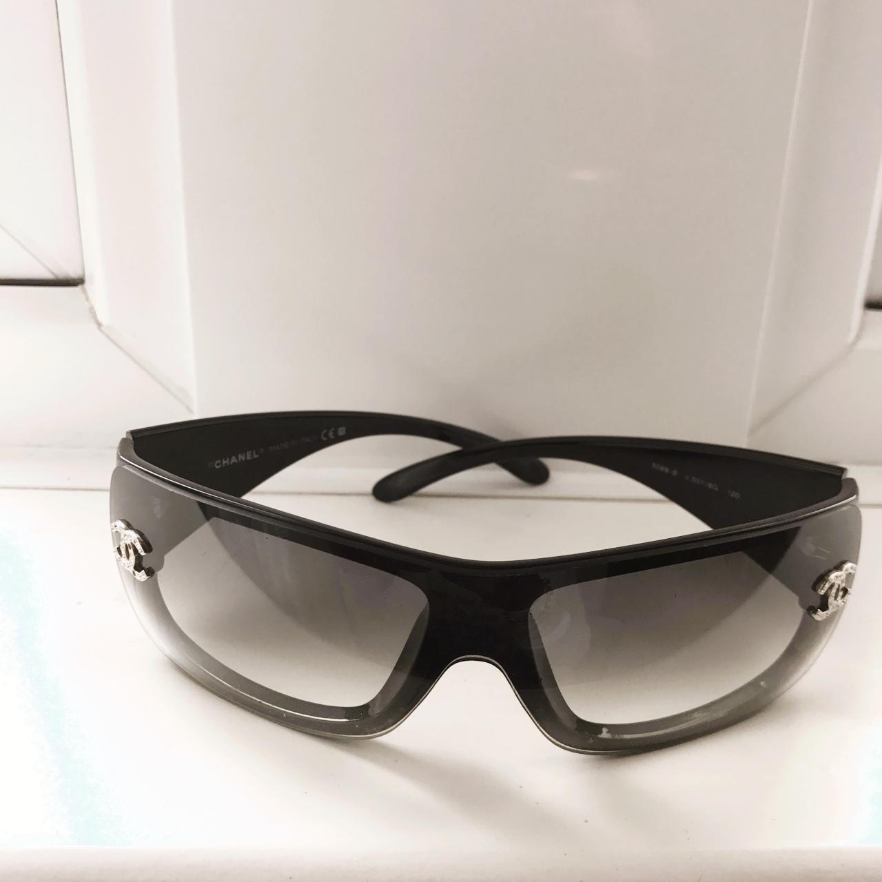 Vintage Chanel sunglasses in classic black with side
