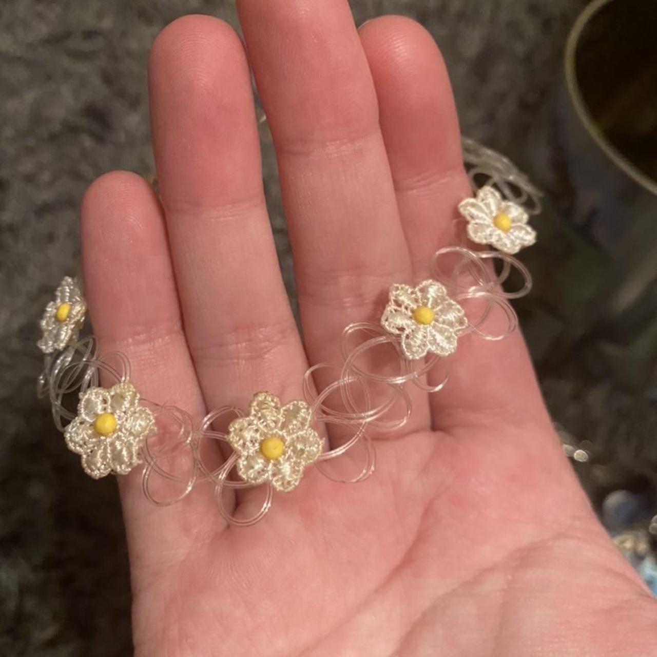 clear tattoo choker with little daisies on