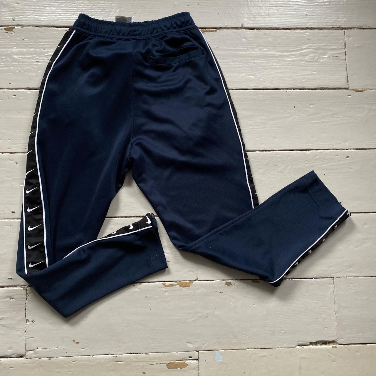 nike repeat tape bottoms