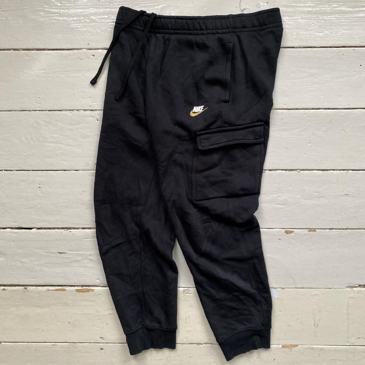 nike swoosh joggers black and gold