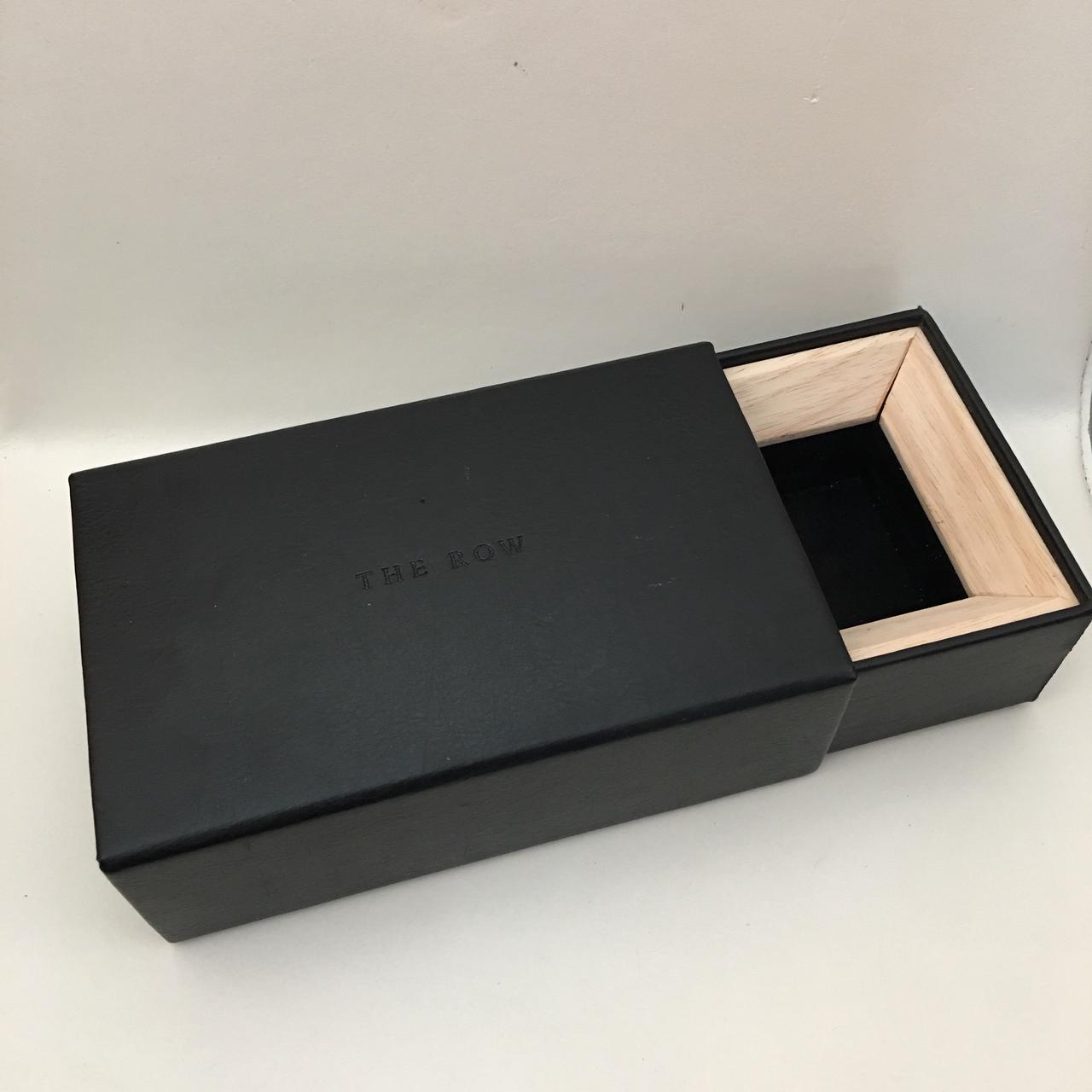 The Row Jewelry Box Black leather box the interior