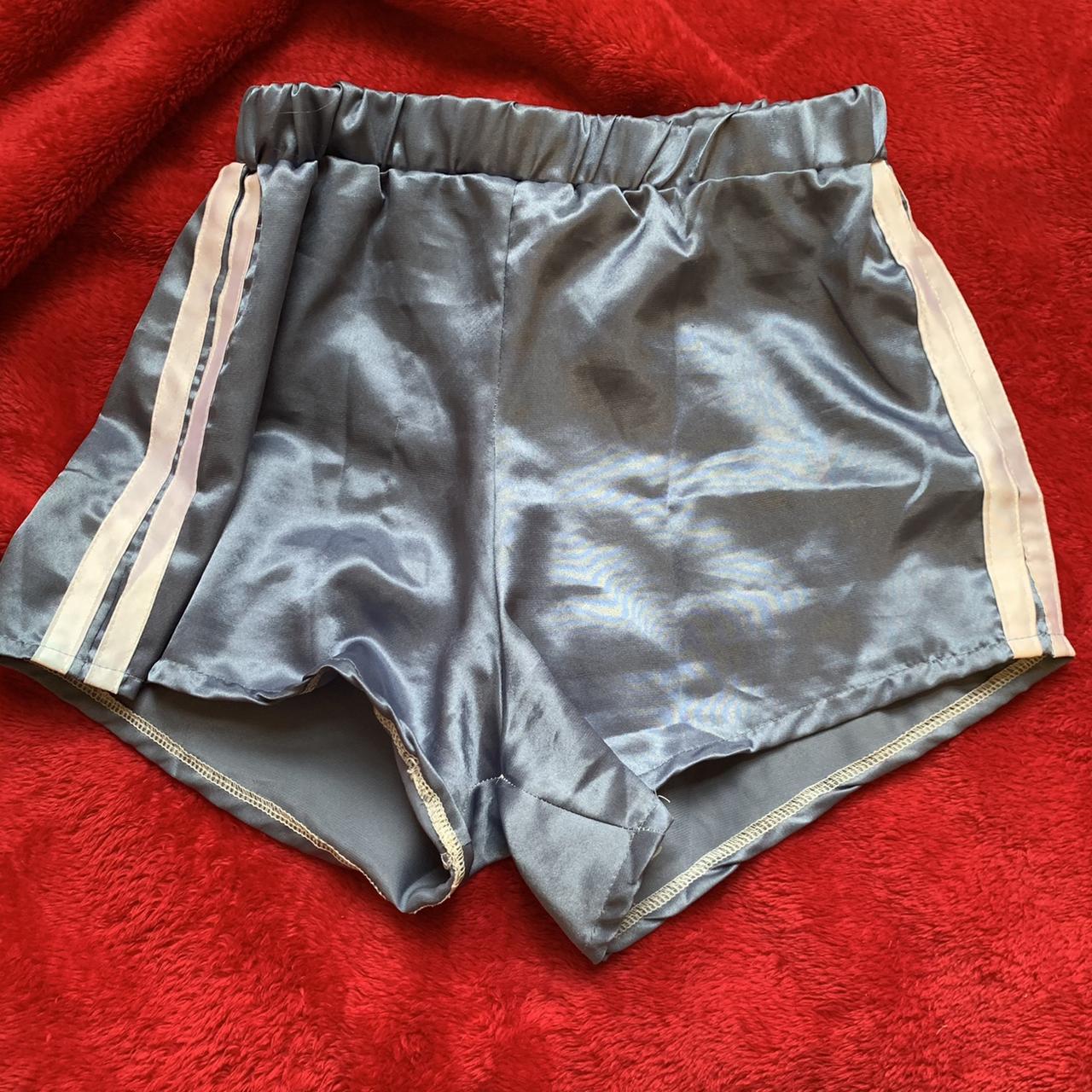 O-mighty baby blue satin booty shorts Size Small,... - Depop