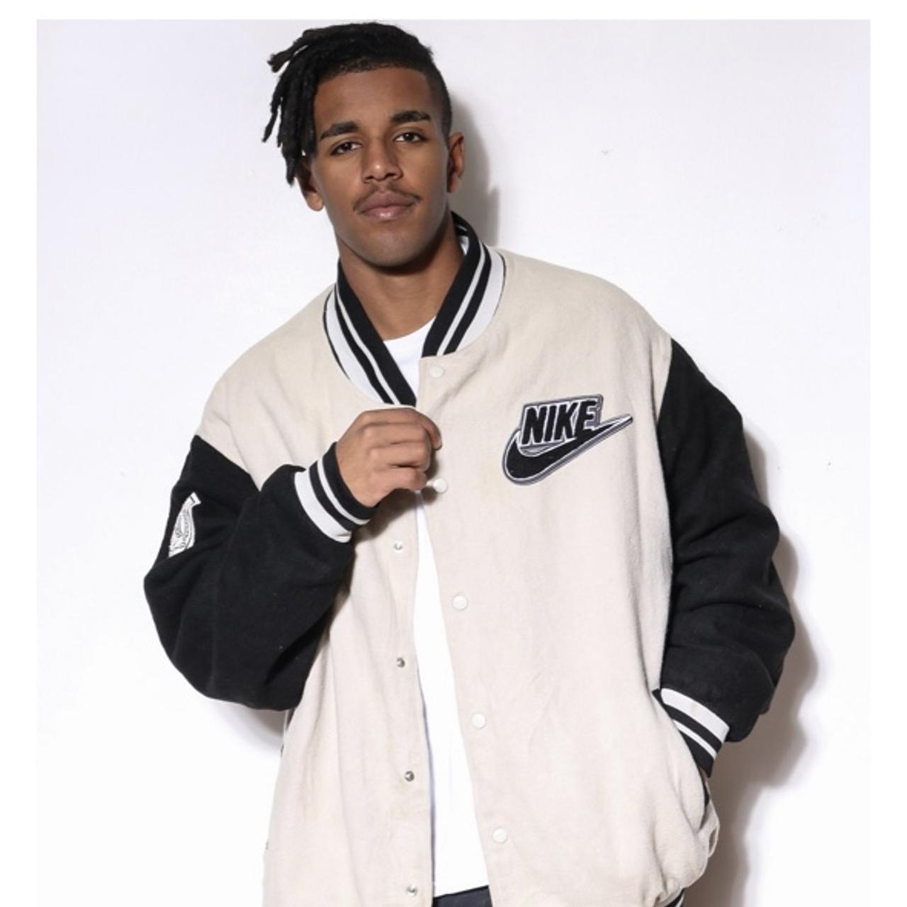 beige nike jacket