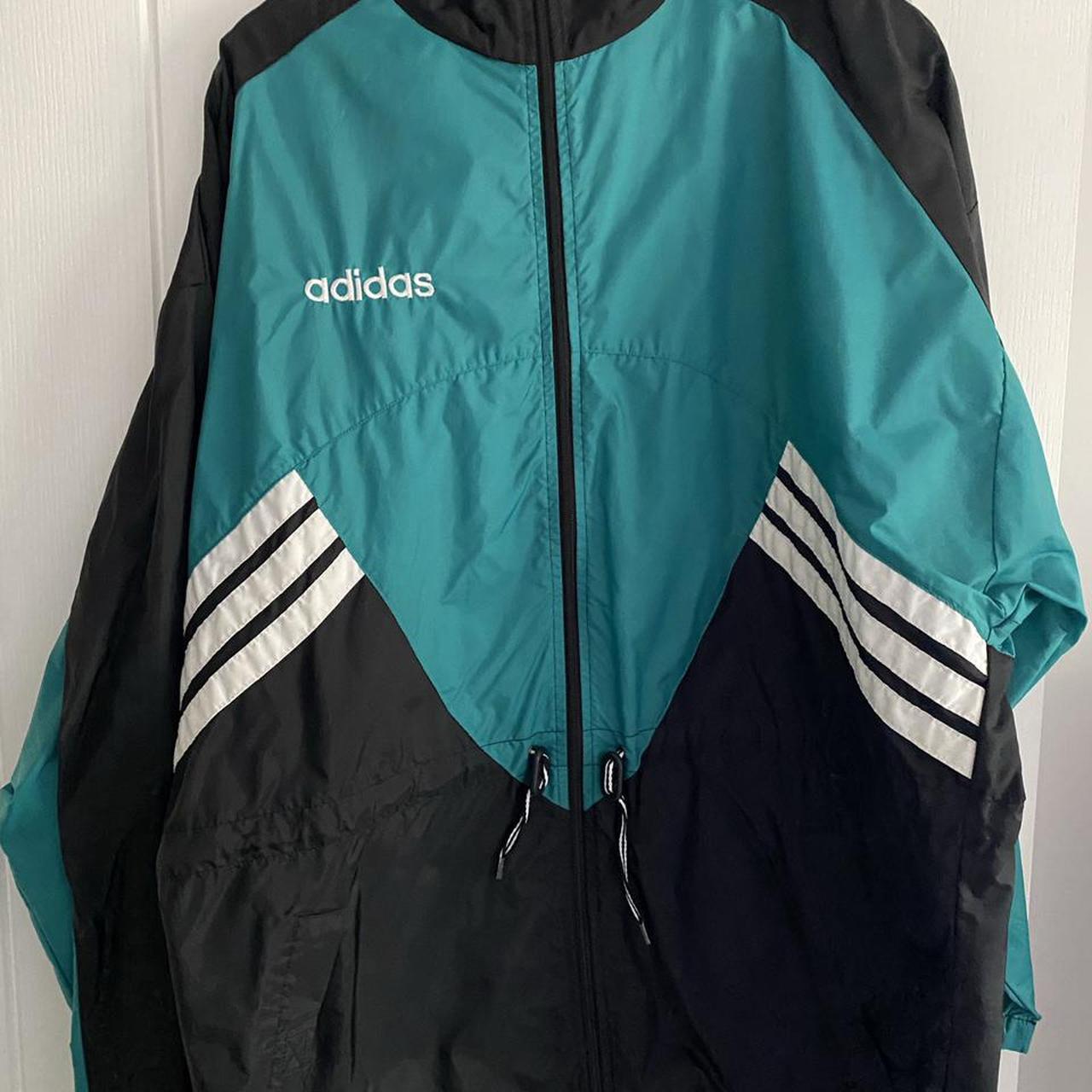 adidas wind breaker jacket selling as is a size... - Depop