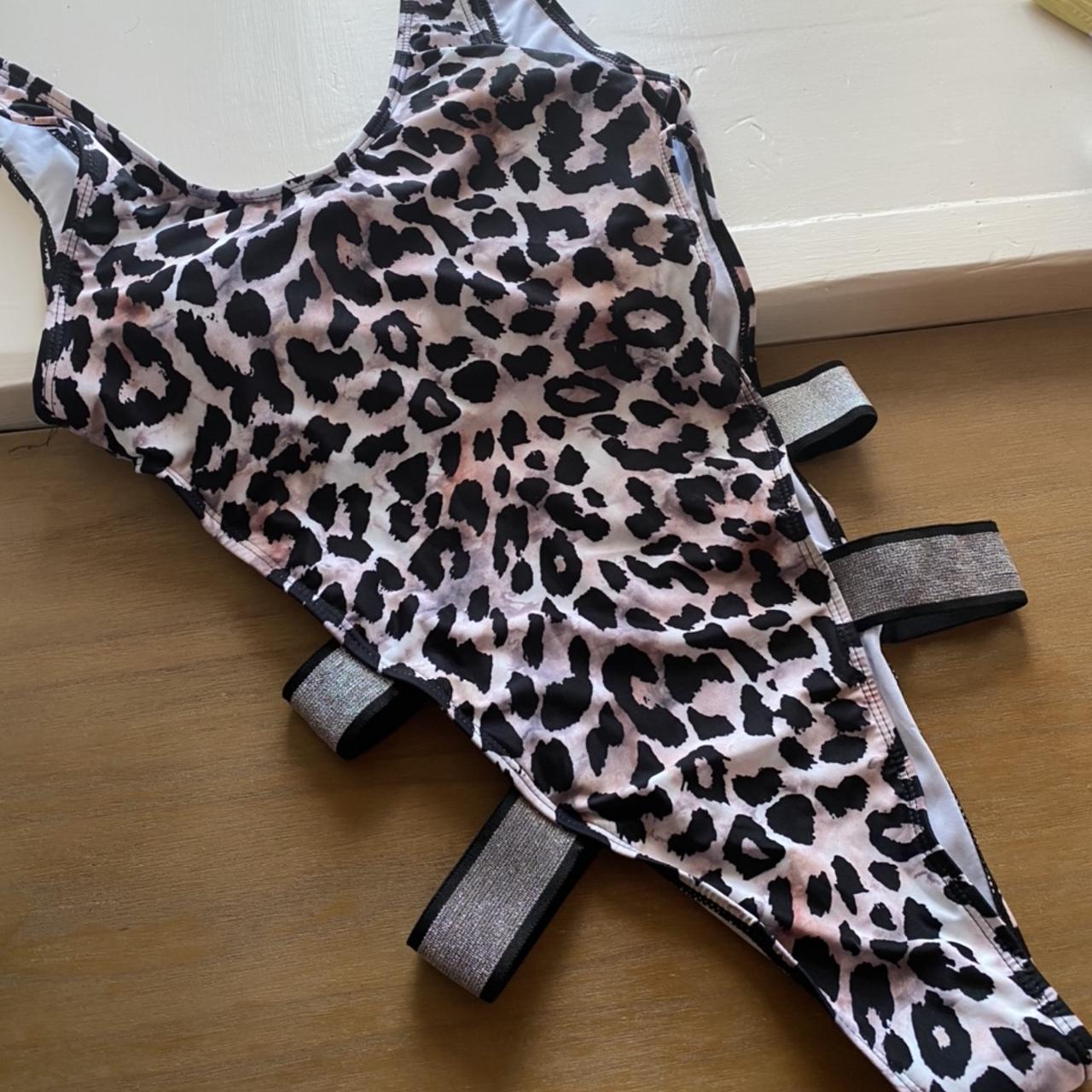 Cut out sparkly leopard swimsuit, it had padding.... - Depop