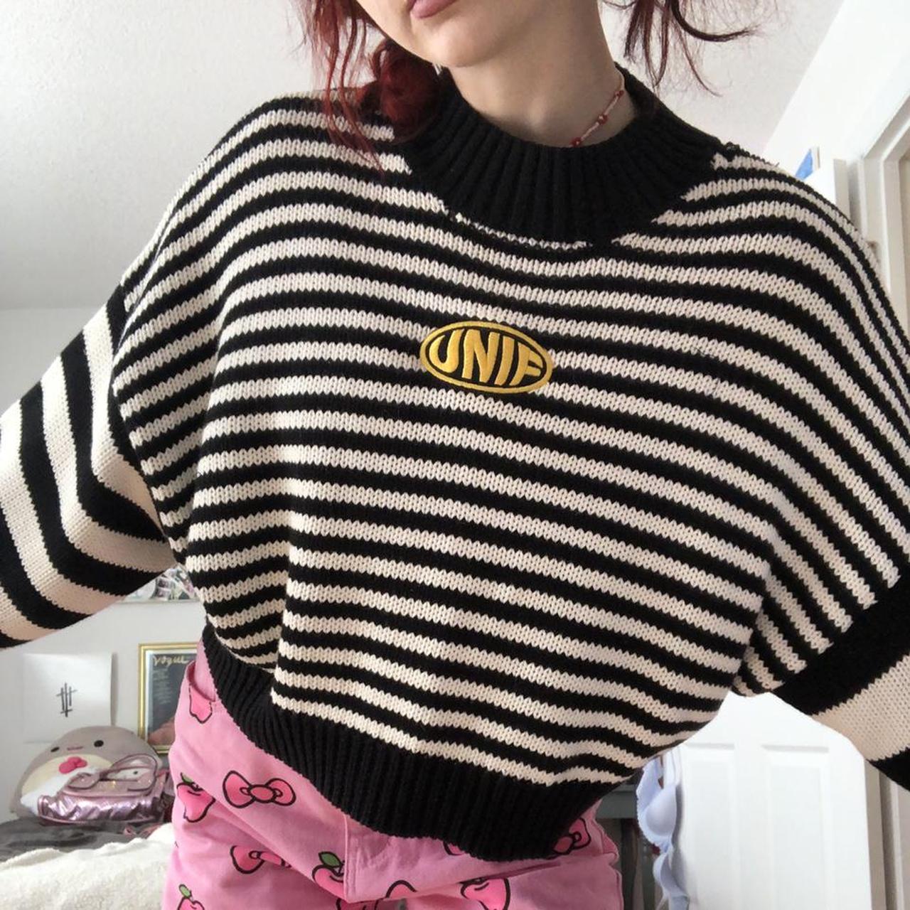 Unif black shop and white sweater