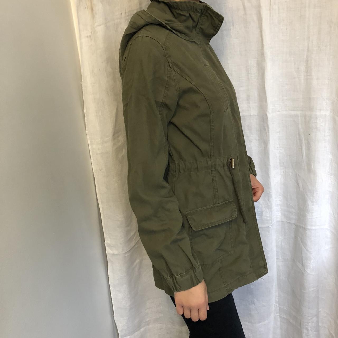 Women’s hooded anorak / army green parka jacket from... Depop