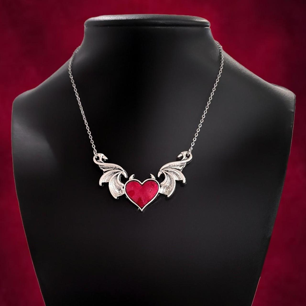 Product Image 2 - Red Batwing Heart Necklace
...
Red Enamel