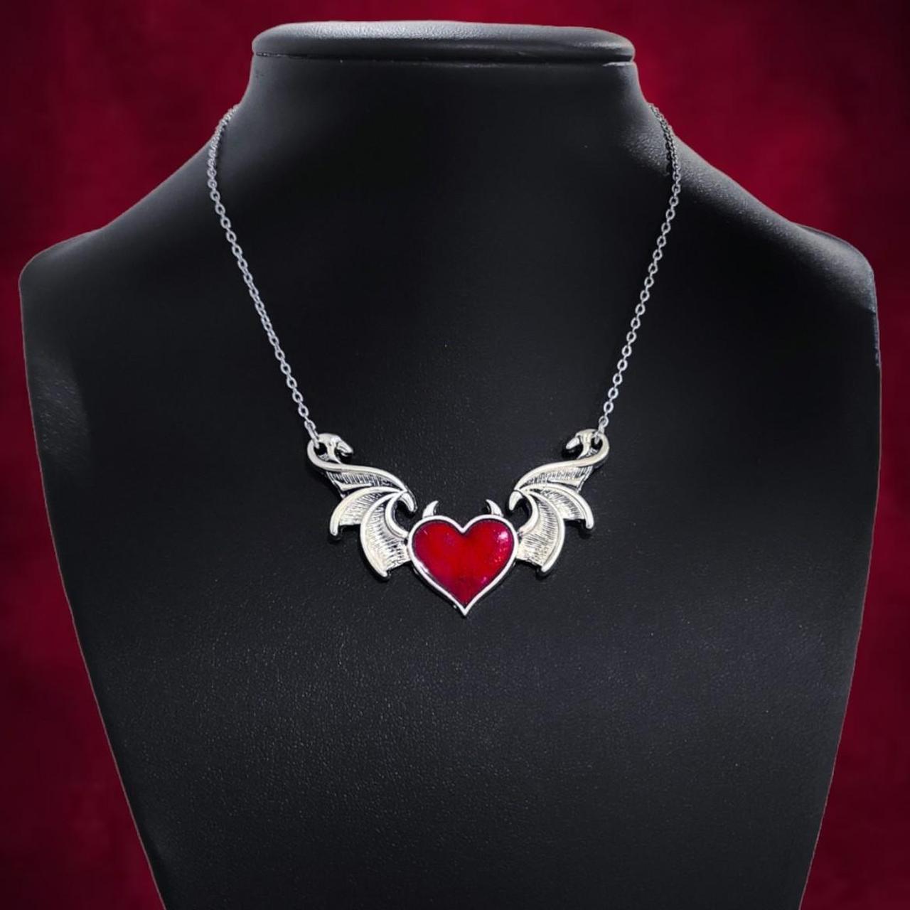 Product Image 1 - Red Batwing Heart Necklace
...
Red Enamel
