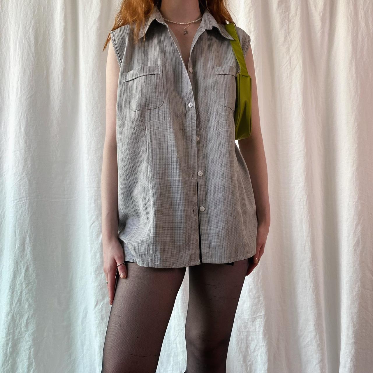 Grey sleeveless shirt Condition excellent, no... Depop