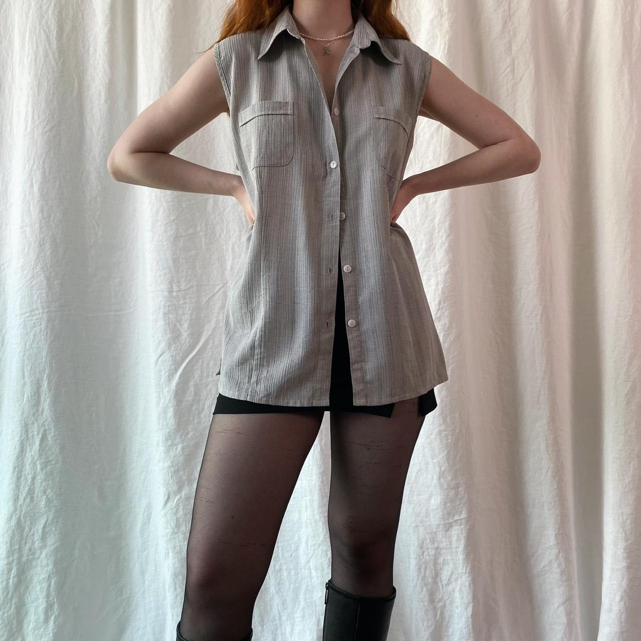 Grey sleeveless shirt Condition excellent, no... Depop