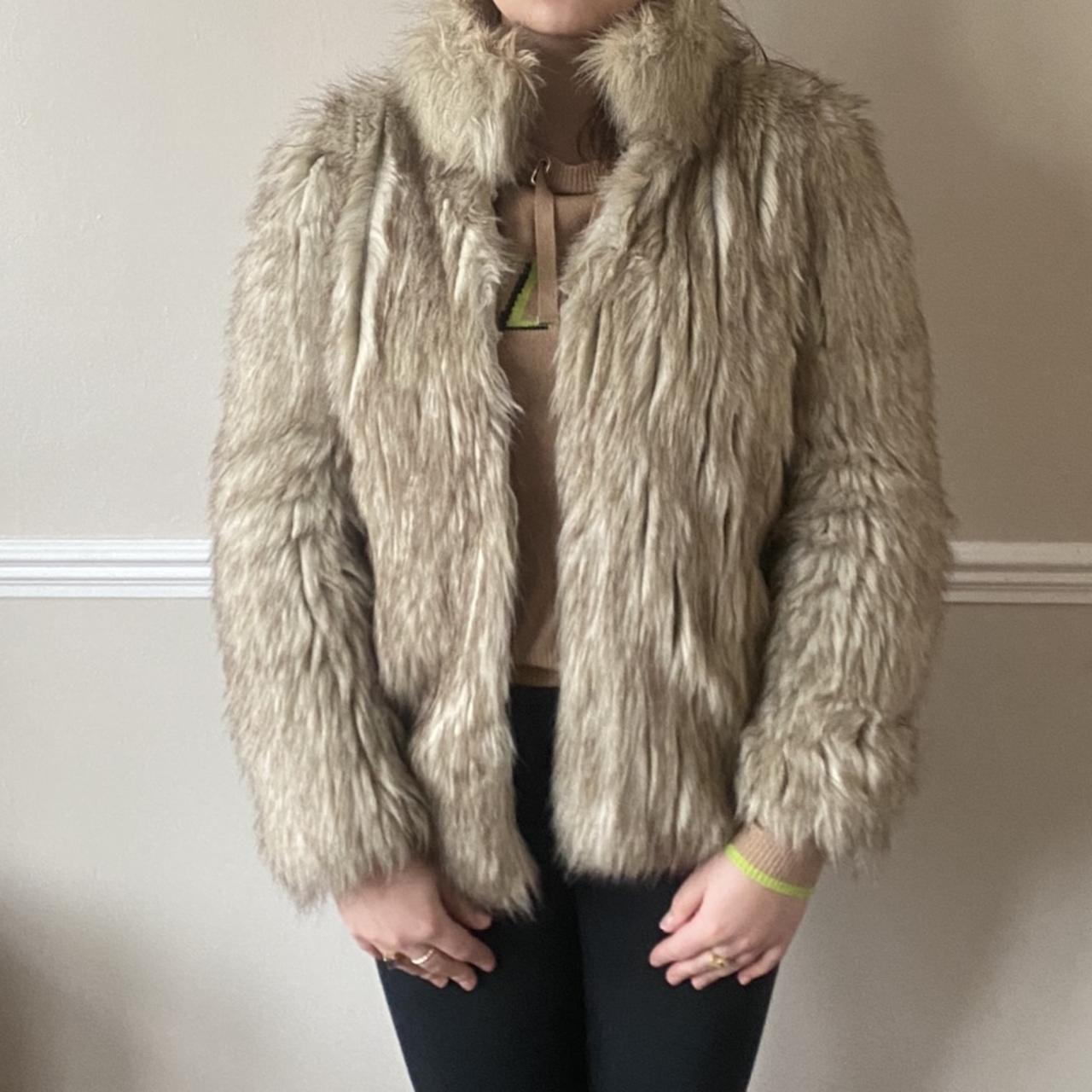 faux fur coat. Size 8 looks really realist... Depop