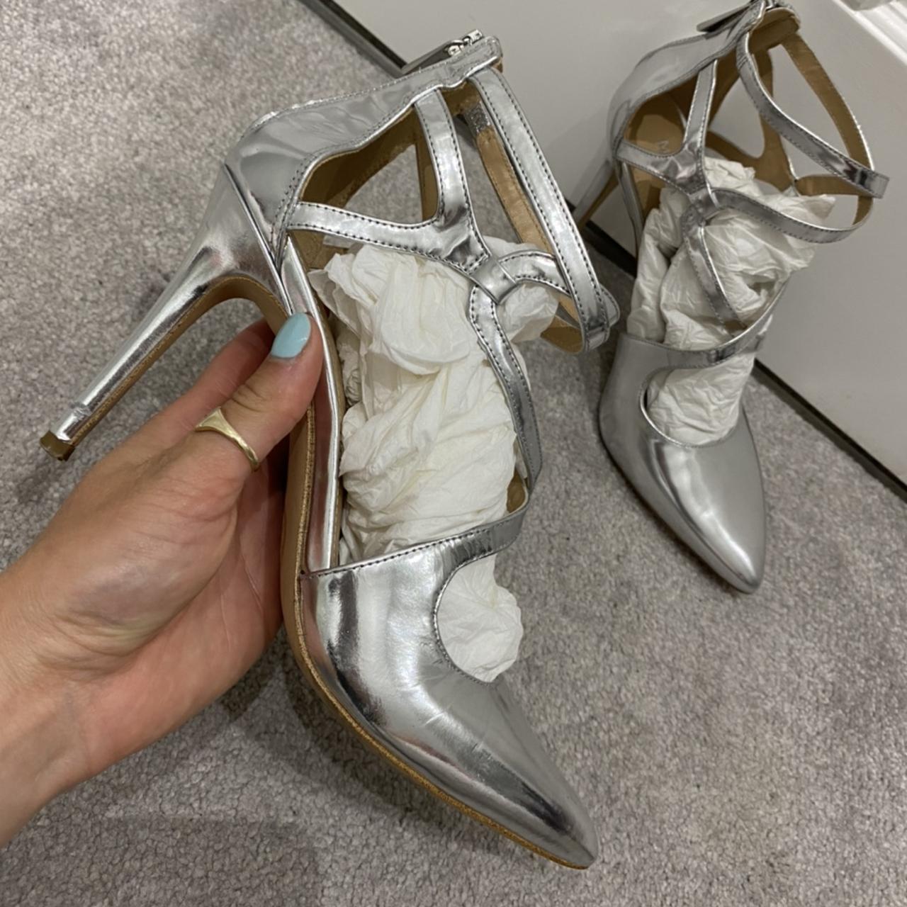 Michael Kors Silver Heels Size 5 US size 7.5 Worn. Depop