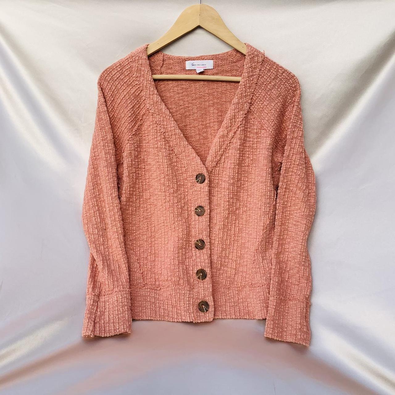 salmon colored cardigan