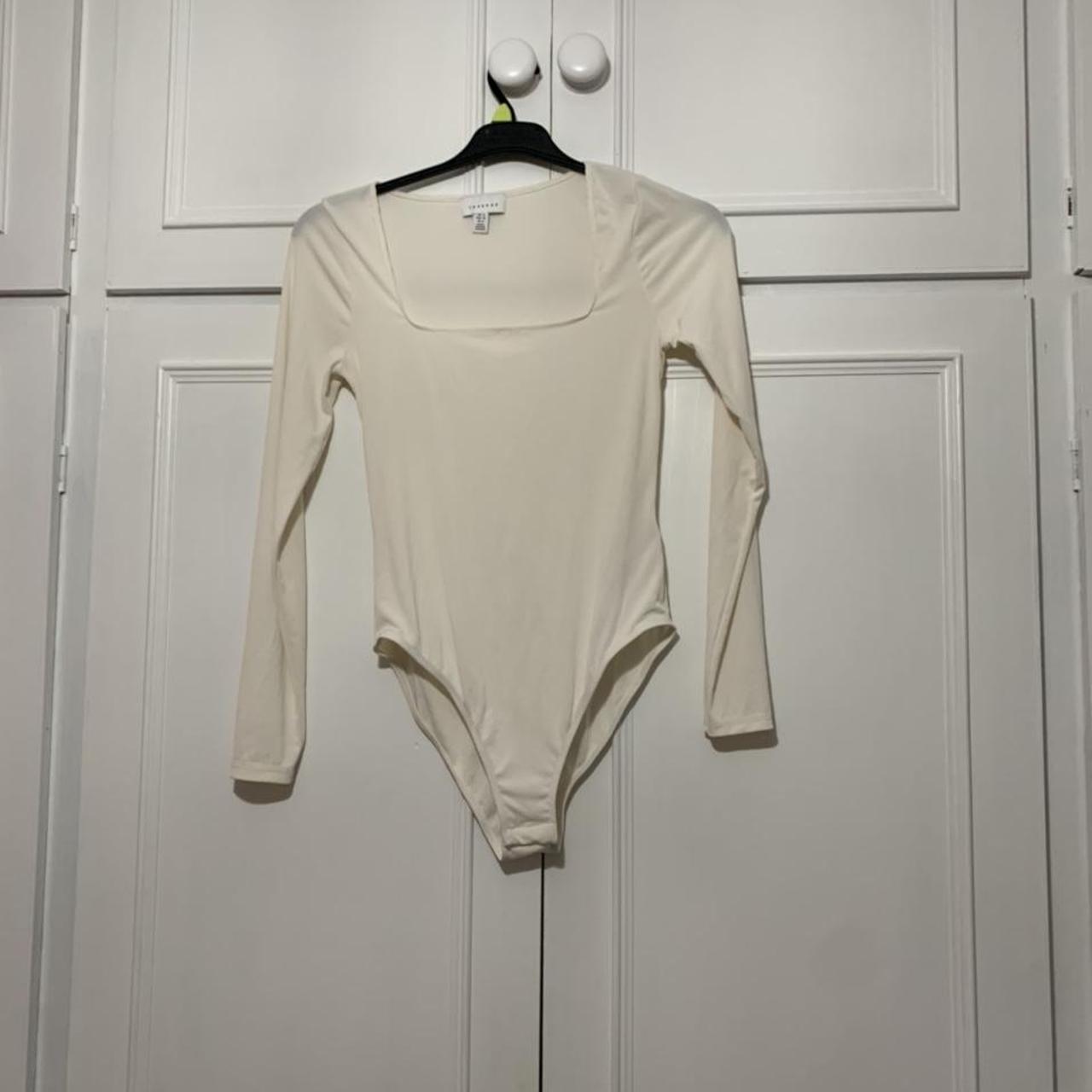 Mooslover bodysuit in shade beige/off white. Gorge - Depop