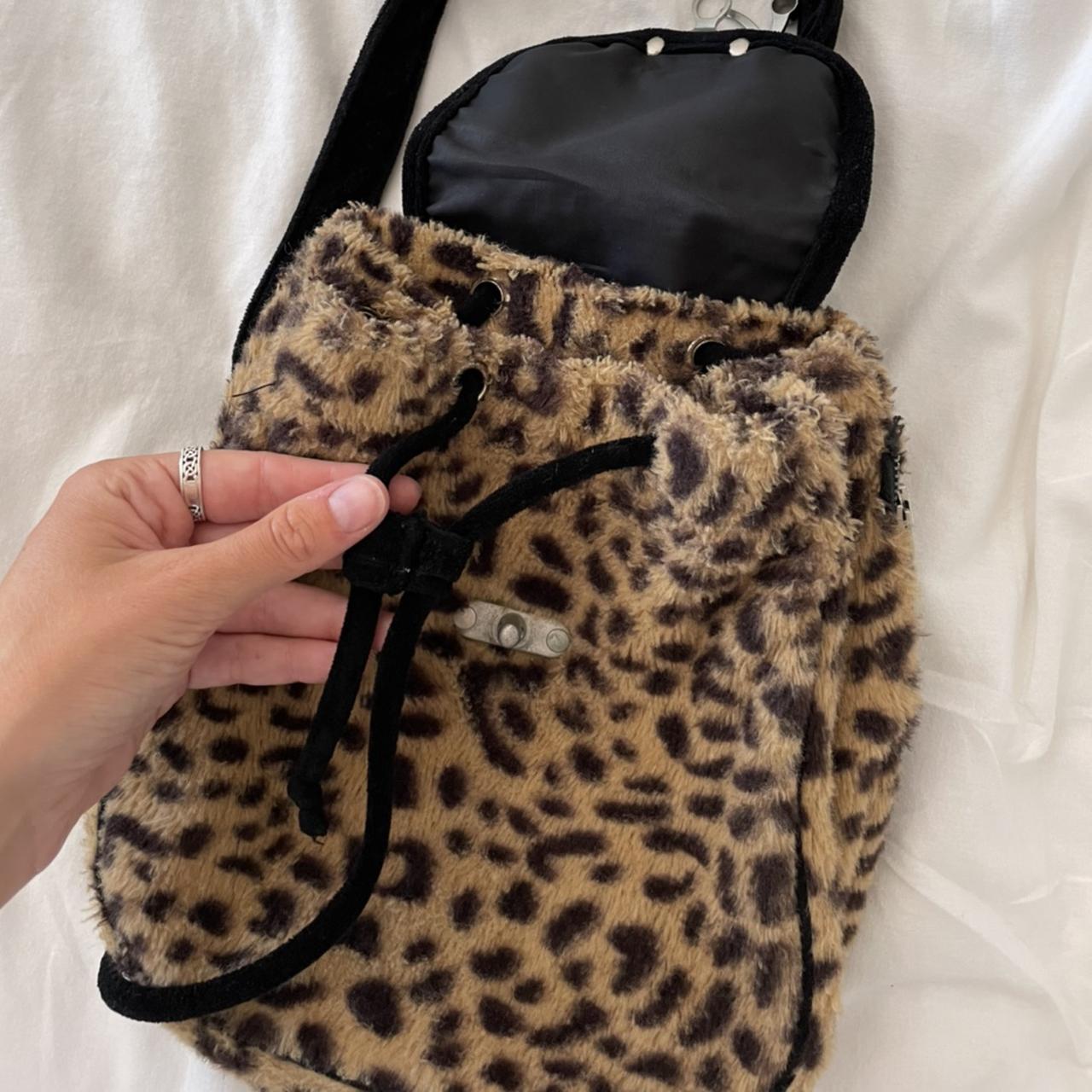 unif mini cheetah backpack rare, drawstring... - Depop