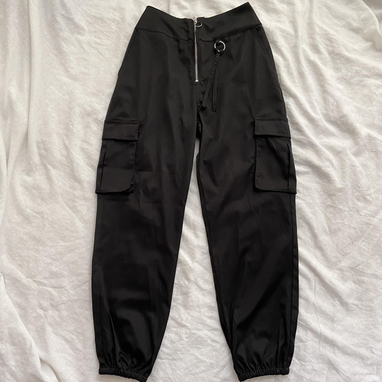 Black slick cargo pants Reworked - originally a size... - Depop